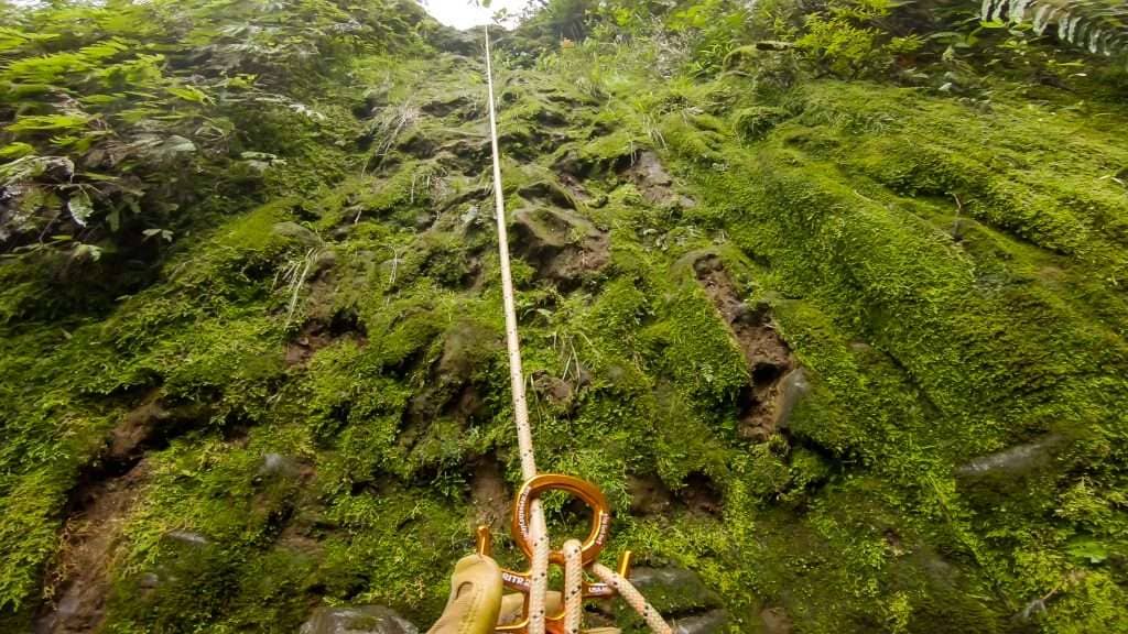 rappelling down a waterfall in costa rica

